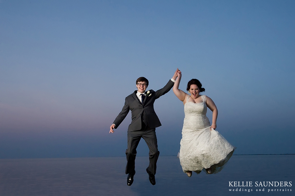 Grosse Pointe war memorial wedding bride and groom jumping